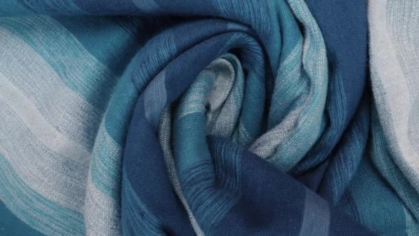 Hand-loomed traditional Moroccan bedcover, throw, from cactus silk and wool, in shades of blue. Abstract fabric background. - Footage, Video