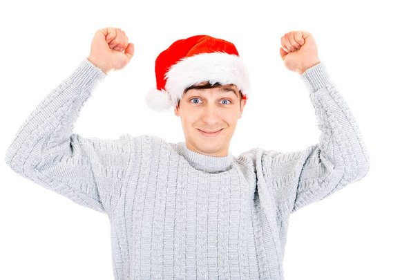 Happy Young Man in Santa Hat with Hands Up Isolated on the White Background - Zdjęcie, obraz