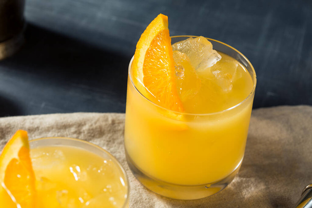 Boozy Vodka Brass Monkey Cocktail with Orange Juice - 写真・画像