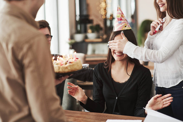 It's your favorite. One of employees have birthday today. Friendly coworkers decides to make surprise for her. - 写真・画像