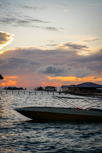Water bungalows and chalets during sunset in Semporna, Sabah. - Photo, Image
