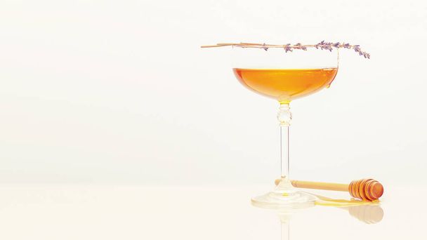 Natural liquid honey in glass glass, lavender sprigs and honey dipper - Valokuva, kuva