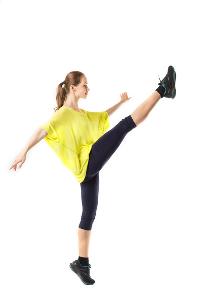 Image of flexible young beautiful girl doing vertical split - Zdjęcie, obraz