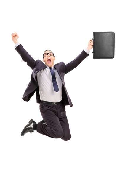 Businessman jumping out of joy - Foto, afbeelding