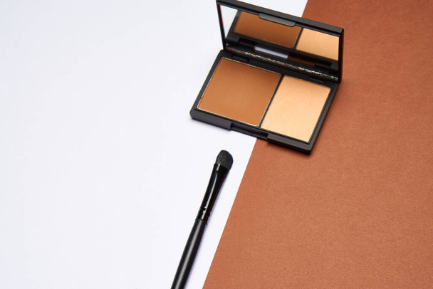 makeup brushes mascara accessories glamor brown background - Foto, Imagem