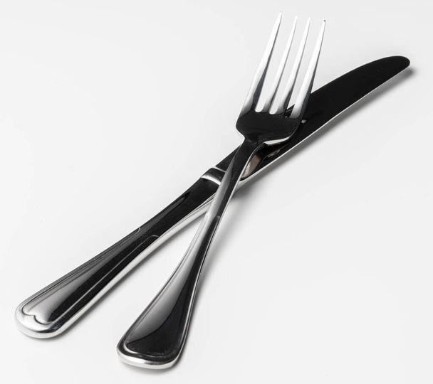 Fork and knife isolated on white background - Photo, image