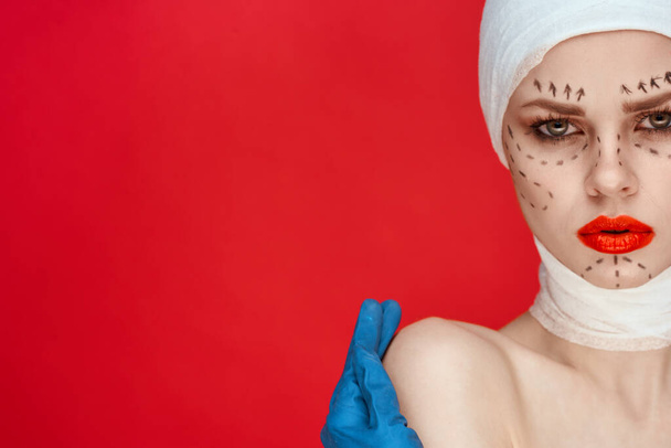 portrait of a woman Red lips plastic surgery operation bare shoulders isolated background - Foto, imagen