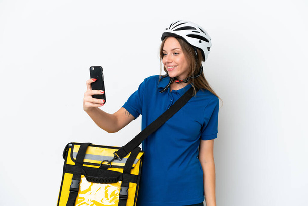 Lithuanian woman with thermal backpack making a selfie - Foto, Bild
