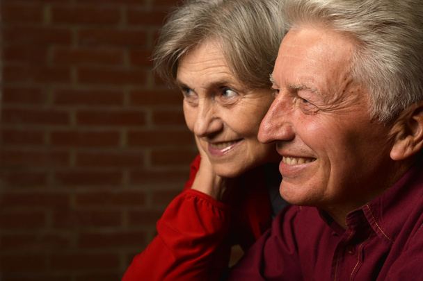 Elderly couple in red - Foto, Imagem