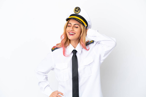 Airplane pilot over isolated white background smiling a lot - Valokuva, kuva