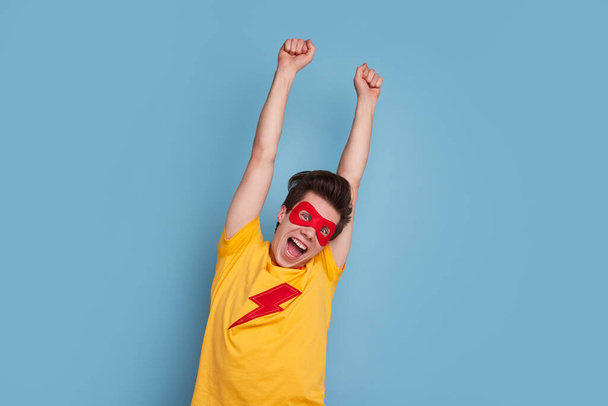 Male superhero screaming in excitement - Фото, изображение