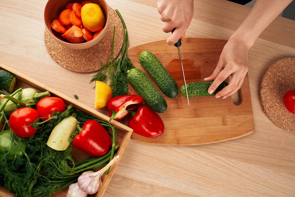 Ingredients slicing salad in the kitchen vitamins view from above - Φωτογραφία, εικόνα