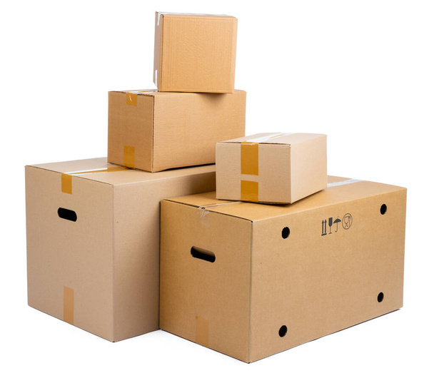 Stack of cardboard boxes isolated on white background - Zdjęcie, obraz