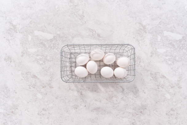 Flat lay. Ingredients for preparing unicorn theme meringue pops on the counter. - Photo, Image