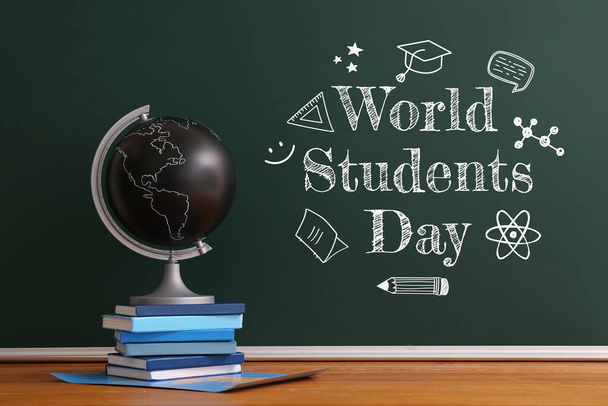 Maailman opiskelijoiden päivän tervehdyskortti maapallon ja kirjojen kanssa - Valokuva, kuva