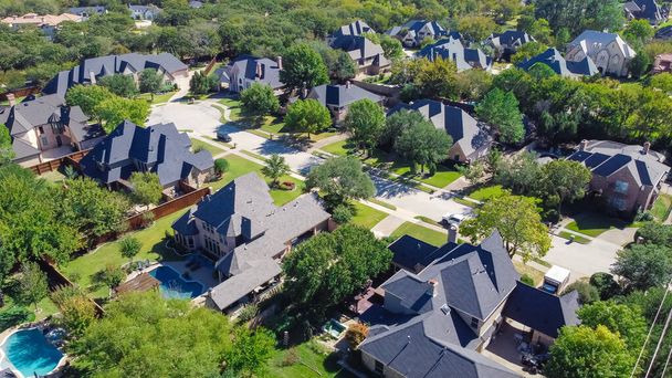Aerial view luxury mansion style single family homes with swimming pools near a cul-de-sac in Grapevine, Texas, America - Photo, Image