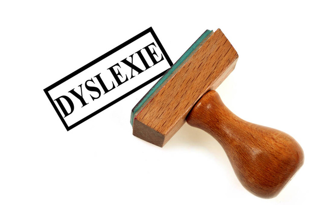 Concept de dyslexie française avec tampon encreur sur fond blanc - Photo, image