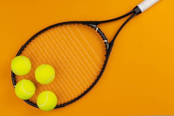 Tennis player sport equipment. Tennis racket and ball - Zdjęcie, obraz