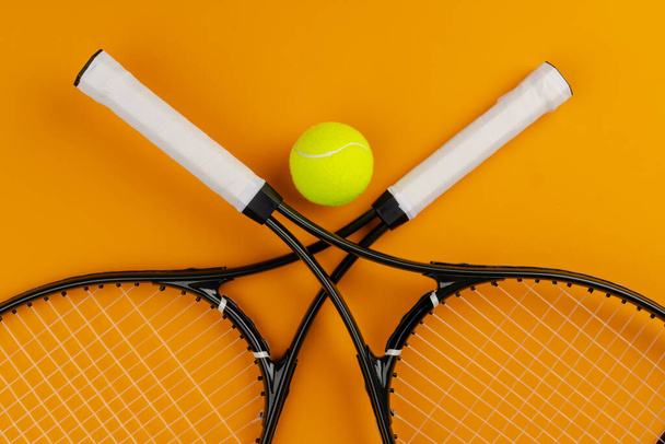 Tennis player sport equipment. Tennis racket and ball - Photo, image