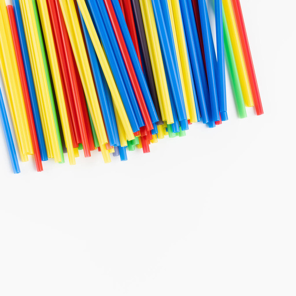 Plastic straws on white background, environment concept - Photo, Image