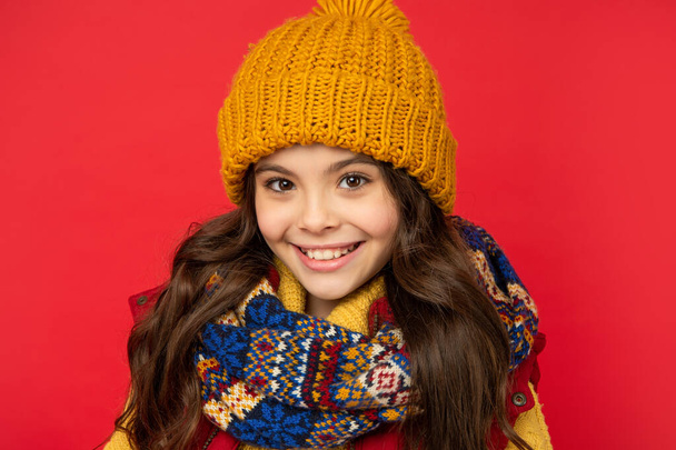 female fashion model. teen girl in scarf. portrait of child wearing warm clothes. - Фото, изображение