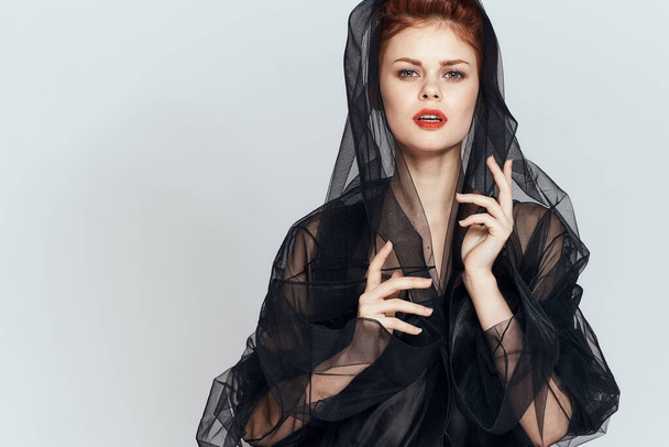 woman with black veil dress posing elegant style - Фото, изображение