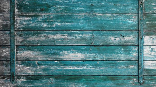 stare abstrakcyjne turkusowe kolorowe malowane złuszczające drewniane deski / drewniana brama / drewniane drzwi tekstury, z kołowrotkiem - drewniane tło shabby - Zdjęcie, obraz