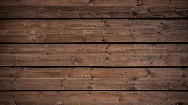 Altes braun rustikal verwittertes dunkles Grunge Holz Tisch Wand Dielenboden Textur - Holz Hintergrund Banner Draufsicht - Foto, Bild
