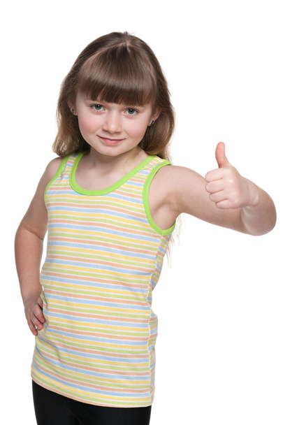 Adorável menina segurando seus polegares para cima
 - Foto, Imagem