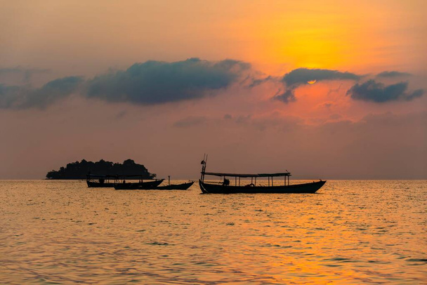 Boats on sea at sunrise from Koh Tui Beach, Koh Touch village, Koh Rong island, Krong Preah Sihanouk, Sihanoukville province, Cambodia, Asia - Φωτογραφία, εικόνα