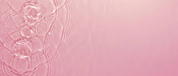transparent pink colored clear calm water surface texture  - Photo, Image