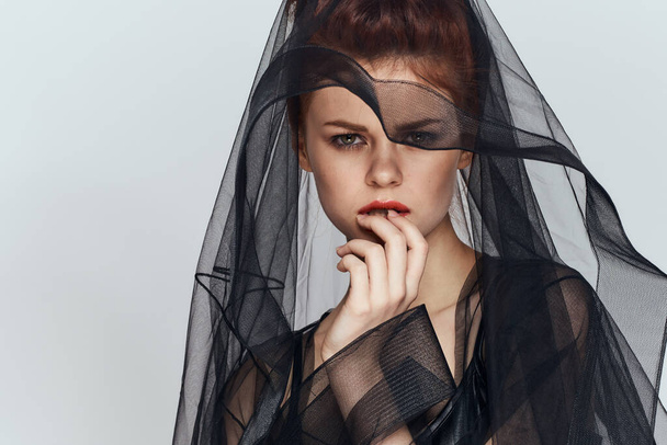 woman with black veil dress posing elegant style - Photo, Image