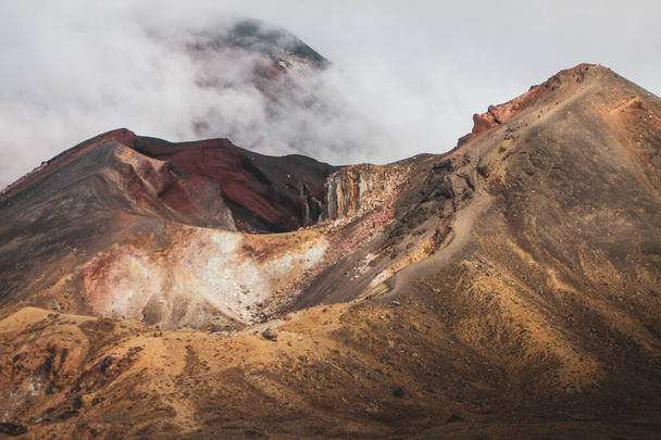 The volcanic hills of a famous Tongariro National Park in New Zealand - Fotografie, Obrázek