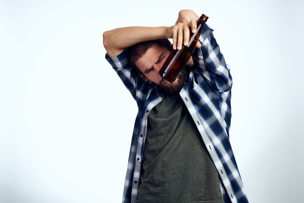 a man in a plaid shirt alcoholism problems emotions depression Lifestyle - Фото, изображение