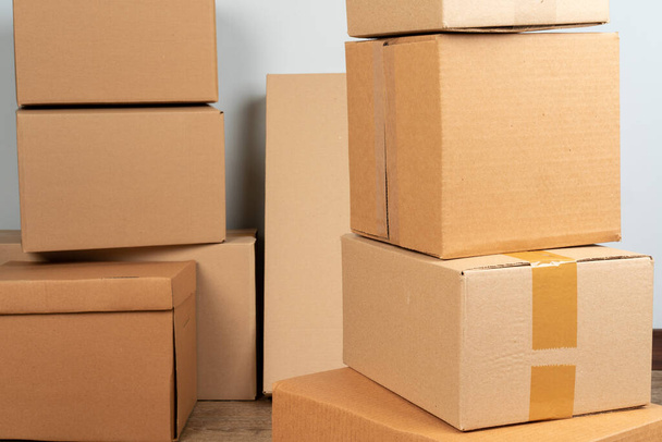Close up photo of a stack of moving boxes - Foto, Imagen