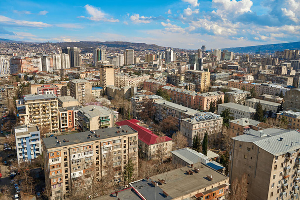 Panorama of a densely populated city. Tbilisi city landscape from above. - Fotografie, Obrázek