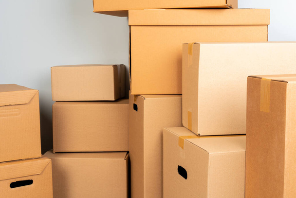 Close up photo of a stack of moving boxes - 写真・画像
