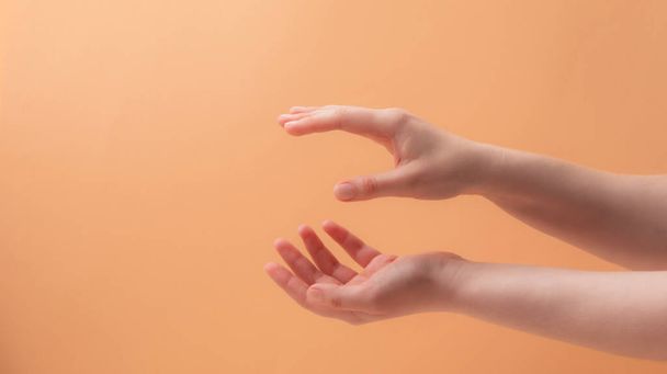 Young female hands applying cream or lotion - Zdjęcie, obraz