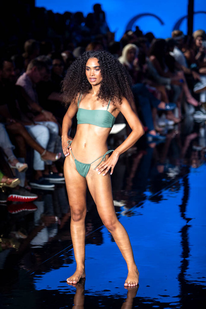A model walks the runway for Jacque Design Swimwear Fashion Show during Art, Hearts, Fashion Swim Week  at the Faena Forum in Miami Beach on  7- 9- 2021 - Fotoğraf, Görsel