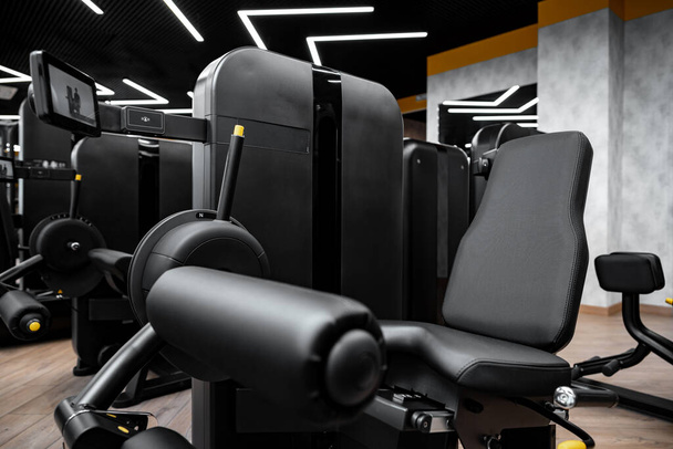 Modern gym interior with new fitness equipment - Φωτογραφία, εικόνα