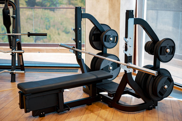Modern gym interior with new fitness equipment - Foto, Imagem
