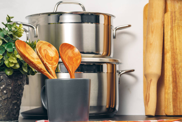 Set of cookware utensils on a kitchen counter - Fotoğraf, Görsel