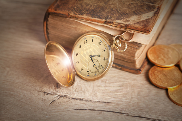Golden pocket watch and law book - Photo, Image