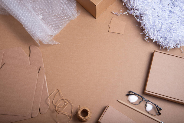 Brown cardboard background warehouse working place - 写真・画像