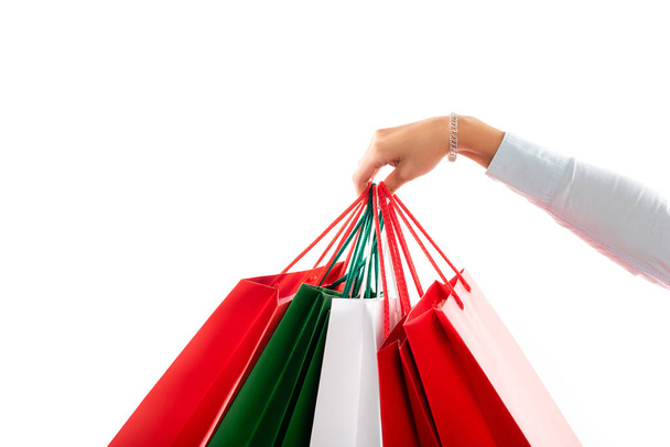 cropped view of woman holding shopping bags isolated on white  - Φωτογραφία, εικόνα