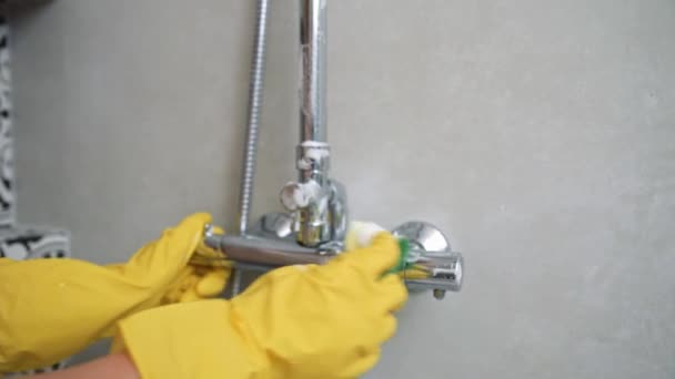 Woman cleaning bathroom shower - Footage, Video