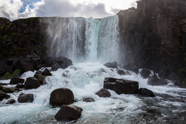 ingvellir National Park - Where You Walk Between Two Continents in Iceland, travel the world, waterfall and river  - Valokuva, kuva