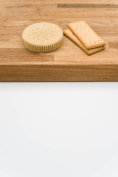 buckwheat flour organic cake and biscuits on a wooden and white background with copy space - Φωτογραφία, εικόνα