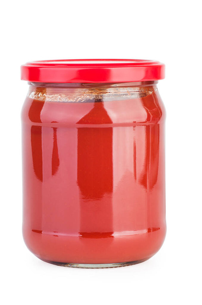 Beyaz arkaplanda izole edilmiş domates ezmeli cam kavanoz - Fotoğraf, Görsel
