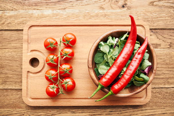 cherry tomatoes hot peppers salad ingredients fresh food - 写真・画像